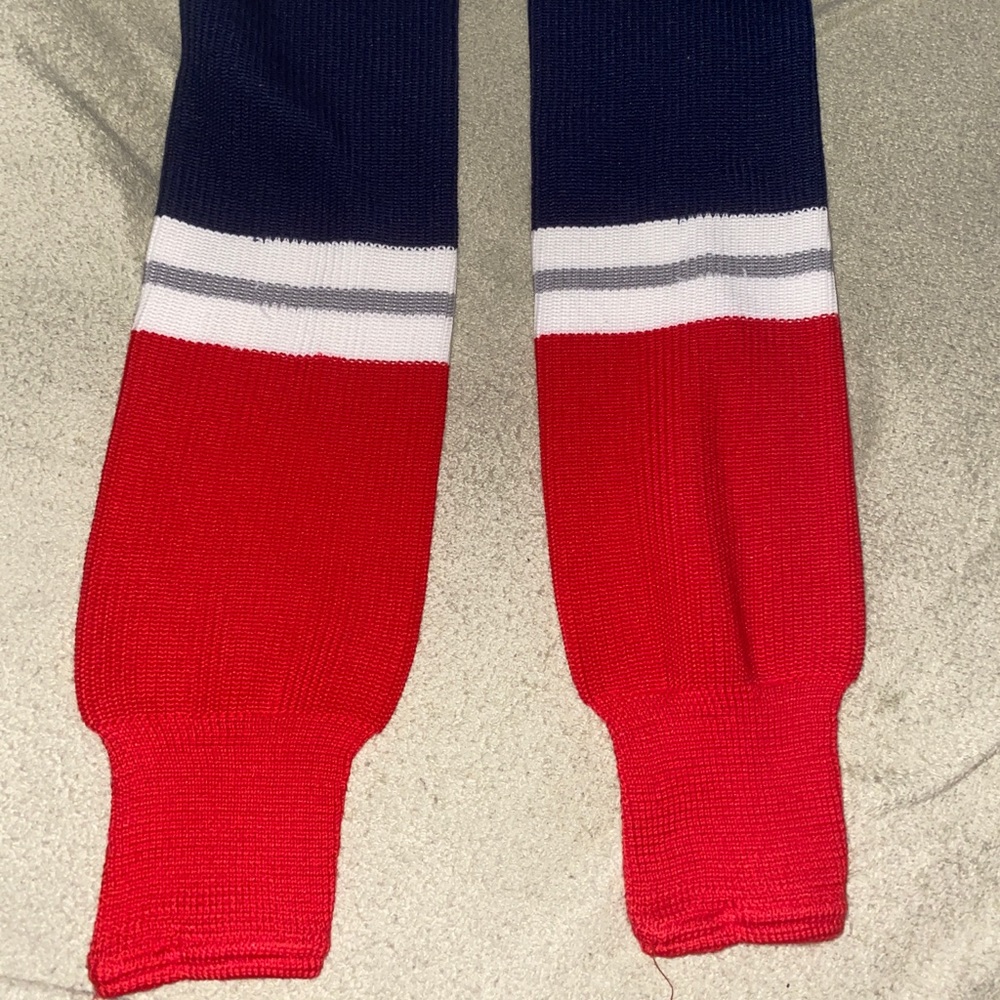 CCM Hockey socks. New York Rangers colors. Size Boy, never used. Shin guards.